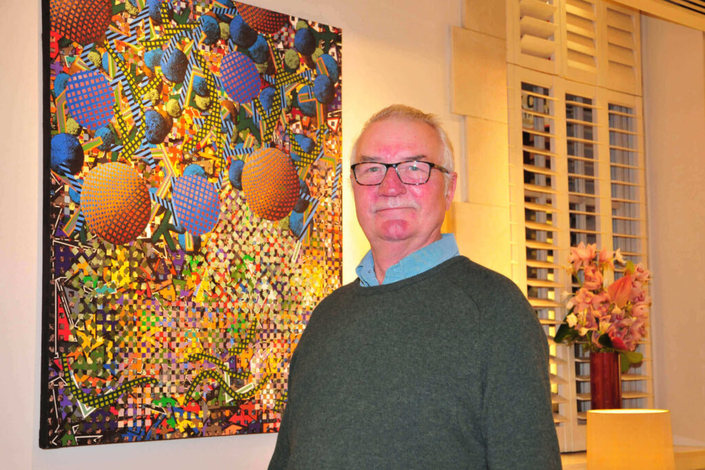 stephen dunn infront of art