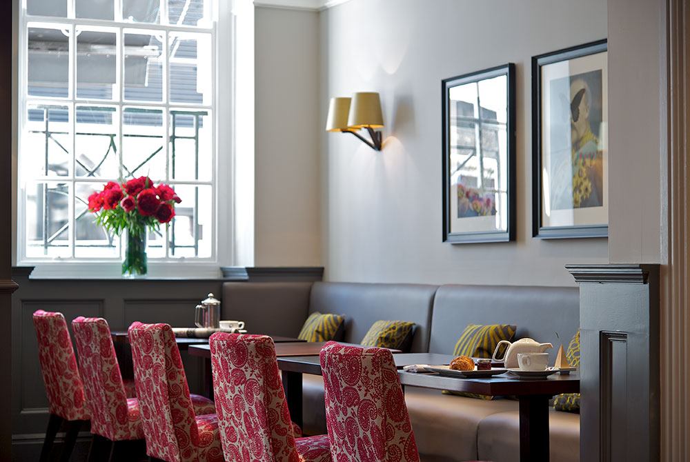A tranquil spot by the window of the Quarter Bar and Lounge