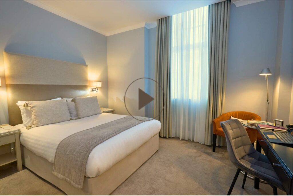 standard room with play button thumbnail